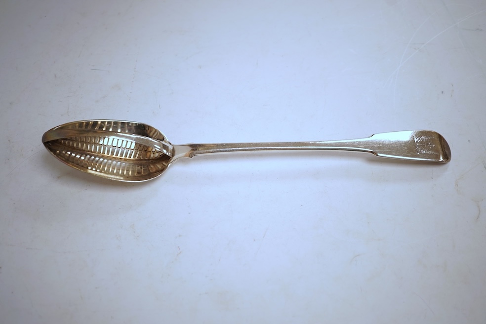 A George III silver fiddle pattern basting/strainer spoon, by Eley & Fearn, London, 1805, 30cm, 5.5oz.